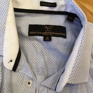 Versace Button up. Blue. Never worn.